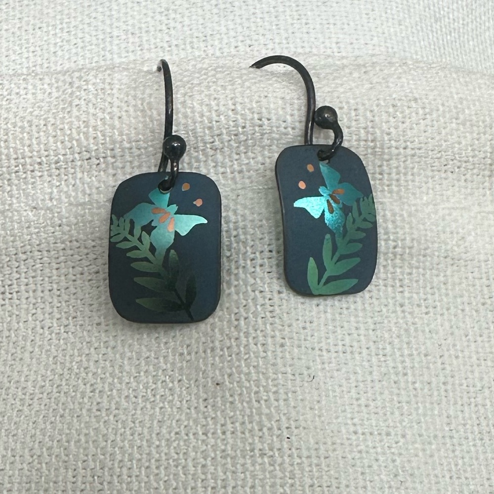 Small dangle earrings with butterfly design
